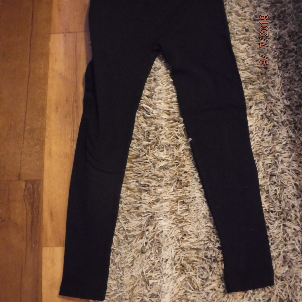 2 pair Black skinny leggings.